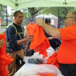 Local 79 Business Manager Mike Prohaska handing out shirts to members