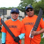 Local 79 members with machetes for brush clearing on a trail